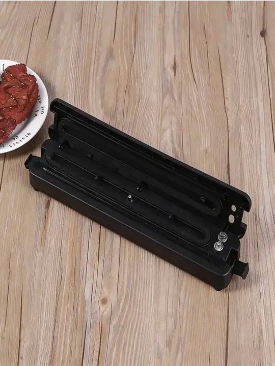 Внутреннее устройство вакууматора Vacuum Sealer — нагревательная лента и вакуумная камера